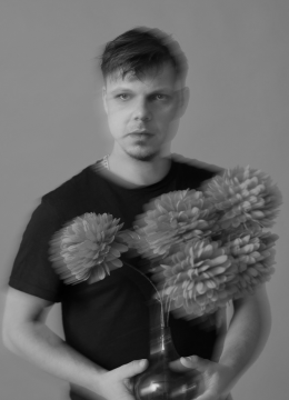 Foto mit Porträt von Raphael Meinhart